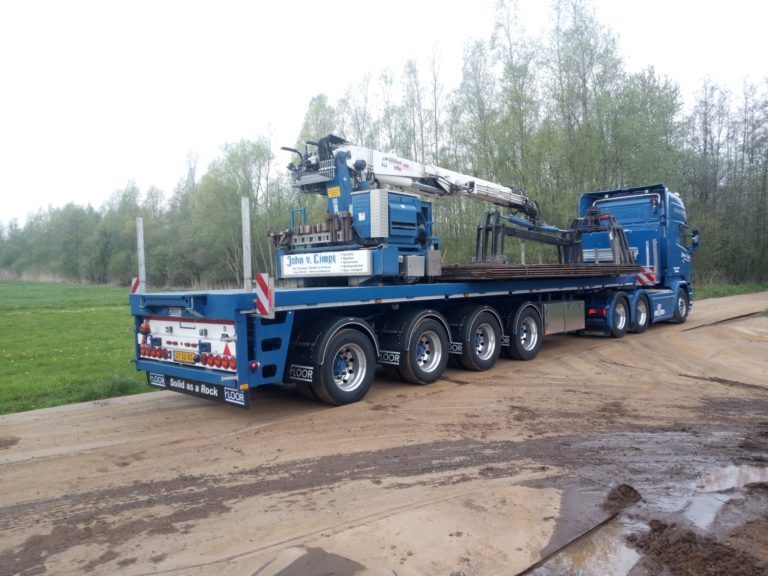 Unique four-axle Floor crane trailer with three steering axles for John van Limpt